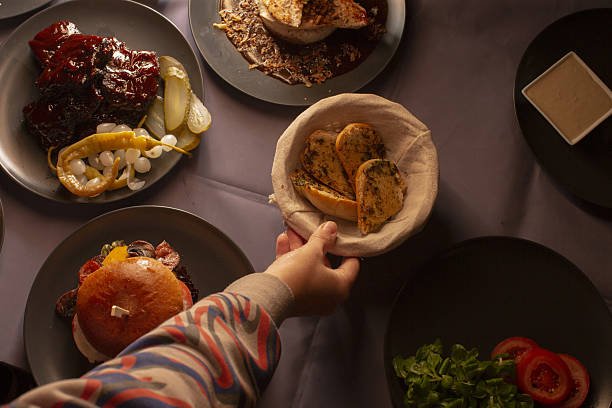 # Top 10 Best Late Night Dishes to Satisfy Your Cravings Late-night hunger can arrive when you least expect it. Maybe you stayed up working, finished a movie, came home after a long day, or simply found yourself craving something delicious after dinner. Whatever the reason, choosing the right meal at night can make the difference between a satisfying snack and a heavy meal that leaves you uncomfortable. The good news is that there are plenty of delicious dishes that work well for late-night eating. From warm noodles and crispy sandwiches to comforting rice dishes and light snacks, the best late-night foods are usually easy to prepare, flavorful, and satisfying without requiring hours in the kitchen. If you are searching for the **top 10 best late night dishes**, this guide brings together a variety of options that can satisfy different types of cravings. Whether you prefer something spicy, savory, cheesy, crispy, or comforting, there is something here worth trying. ## What Makes a Good Late Night Dish? A great late-night dish does not necessarily have to be complicated. In fact, simple food is often the best choice when you are hungry late at night. The ideal late-night dish should be relatively easy to prepare and should contain enough flavor to make you feel satisfied. Ingredients that are already available in your kitchen can also make a dish more convenient. Some people prefer light foods before bed, while others want a proper meal. Your choice can depend on how hungry you are, what you have eaten during the day, and how soon you plan to sleep. The following dishes offer a mixture of quick comfort foods, filling meals, and lighter choices. # 1. Ramen Noodles Ramen is one of the easiest and most popular choices when hunger strikes late at night. A basic bowl of noodles can be prepared in just a few minutes, making it perfect when you do not want to spend much time cooking. Instant ramen can be upgraded with simple ingredients such as a boiled egg, green onions, mushrooms, spinach, corn, or sliced chicken. Adding vegetables can give the bowl more texture and flavor, while an egg can make it more satisfying. For people who enjoy spicy food, a little chili oil, chili flakes, or hot sauce can completely change the character of the dish. You can also prepare a homemade ramen bowl using broth, noodles, vegetables, and your preferred protein. This gives you much more control over the flavor and ingredients. ### Why ramen works late at night * Quick to prepare * Easy to customize * Warm and comforting * Works with simple ingredients * Suitable for different flavor preferences If you want something warm, savory, and comforting, ramen is an excellent late-night option. # 2. Grilled Cheese Sandwich Few foods are as simple and satisfying as a grilled cheese sandwich. Crispy bread combined with melted cheese creates a comforting meal that can be prepared with only a handful of ingredients. The basic version requires bread, cheese, and a little butter or oil. However, you can make it more interesting by adding tomato, mushrooms, onions, jalapeños, chicken, turkey, or even a little garlic seasoning. The key to a good grilled cheese sandwich is cooking it over medium heat. This allows the bread to become golden and crisp while giving the cheese enough time to melt properly. For an extra satisfying late-night meal, serve the sandwich with tomato soup. The combination of crispy bread, melted cheese, and warm soup is particularly comforting on a cold evening. ### Easy grilled cheese idea Take two slices of bread, add your favorite cheese, lightly butter the outside, and cook both sides in a pan until golden brown. Cut it in half and enjoy it while the cheese is still warm and melted. # 3. Chicken Fried Rice Chicken fried rice is another excellent choice for late-night cravings because it can turn leftover rice into a completely new meal. Cooked rice, chicken, eggs, vegetables, soy sauce, and a little cooking oil are usually enough to create a flavorful dish. You can also use leftover vegetables from your refrigerator. The secret to good fried rice is using rice that is already cooked and cooled. This helps prevent the dish from becoming too soft or sticky. Start by cooking the chicken and vegetables. Add the egg, followed by the rice and seasonings. A little soy sauce adds saltiness and depth, while sesame oil can provide a pleasant aroma. Chicken fried rice is especially useful when you want something more substantial than a snack but do not want to prepare an elaborate dinner. ### Why it is a great late-night meal Chicken fried rice is filling, customizable, and an excellent way to use leftovers. You can make it mild or spicy depending on your preference. # 4. Loaded Nachos When the craving is for something crunchy, cheesy, and flavorful, loaded nachos are hard to beat. Nachos can be prepared quickly by layering tortilla chips with cheese and your favorite toppings. Depending on what you have available, you can add chicken, beans, jalapeños, onions, tomatoes, corn, olives, or salsa. Bake the nachos until the cheese melts, then add fresh toppings such as avocado, cilantro, or sour cream. One of the best things about nachos is that there are almost no strict rules. You can make a small personal serving or prepare a large plate to share with friends. For a late-night snack, try keeping the toppings simple. Cheese, salsa, beans, and jalapeños can create plenty of flavor without requiring extensive preparation. ### Best toppings for late-night nachos * Shredded cheese * Black beans * Grilled chicken * Jalapeños * Tomatoes * Sweet corn * Salsa * Sour cream * Avocado Loaded nachos are particularly enjoyable during movie nights, game nights, or casual gatherings. # 5. Chicken Shawarma Wrap A chicken shawarma wrap is an excellent option for anyone looking for a flavorful and satisfying late-night dish. Tender seasoned chicken is combined with vegetables and sauce before being wrapped in flatbread or pita. Garlic sauce, yogurt sauce, tahini, lettuce, tomatoes, cucumbers, and pickles can all work beautifully. If you have leftover cooked chicken, preparing a shawarma-style wrap becomes even easier. Simply slice the chicken, warm it with spices, and place it inside your bread with your preferred toppings. The combination of warm chicken, fresh vegetables, and creamy sauce makes this dish satisfying without requiring a complicated cooking process. ### Simple shawarma wrap combination Use warm flatbread, seasoned chicken, lettuce, tomato, cucumber, pickles, and garlic sauce. Roll everything tightly and toast the outside for a few minutes if you prefer a crispier wrap. This is one of the **top 10 best late night dishes** for people who want something flavorful and filling. # 6. Masala Omelette Eggs are one of the most convenient ingredients for a late-night meal, and a masala omelette can transform them into something much more exciting. A basic masala omelette can include eggs, onions, tomatoes, green chilies, coriander, salt, and black pepper. You can also add cheese, mushrooms, spinach, or leftover chicken. Beat the eggs, mix in the ingredients, and cook everything in a lightly oiled pan. The entire process can take only a few minutes. Masala omelette is especially useful when you want a quick meal without ordering takeout. It can be served alone, with toast, or inside a sandwich. ### Why eggs are popular at night Egg-based dishes are quick, versatile, and easy to customize. You can make a simple omelette when you are only slightly hungry or add additional ingredients when you want something more substantial. For a spicy late-night meal, add chopped green chilies and a little chili powder. # 7. Pizza Toast Pizza toast is a simple alternative to traditional pizza and can be prepared much faster. Instead of making pizza dough, use slices of bread as the base. Add pizza sauce, mozzarella cheese, and your favorite toppings. Place the slices in an oven, toaster oven, or air fryer until the cheese melts and the bread becomes crisp. Pepperoni, mushrooms, onions, bell peppers, olives, chicken, and tomatoes all make excellent toppings. Pizza toast is particularly useful when you have leftover ingredients in your refrigerator. You can make one or two slices for yourself without preparing an entire pizza. ### Quick pizza toast recipe Spread pizza sauce over a slice of bread. Add shredded mozzarella and your preferred toppings. Season with oregano and black pepper, then toast until the cheese is melted and lightly golden. The result is crispy, cheesy, and full of familiar pizza flavor. # 8. Spicy Garlic Noodles For people who love bold flavors, spicy garlic noodles are an excellent late-night choice. Noodles can be combined with garlic, chili flakes, soy sauce, sesame oil, and a few vegetables to create a dish that tastes far more complicated than it actually is. Start by boiling your noodles. While they cook, prepare a simple sauce using minced garlic, soy sauce, chili flakes, and sesame oil. Toss the cooked noodles through the sauce and add green onions or sesame seeds. You can also add an egg, tofu, chicken, shrimp, or vegetables if you want more substance. The garlic and chili combination gives these noodles a strong flavor, making them ideal when you are craving something savory and spicy. ### Tips for better garlic noodles Do not burn the garlic because it can quickly become bitter. Cook it gently until fragrant before adding the other ingredients. You can also adjust the amount of chili according to your personal preference. A small amount creates gentle warmth, while additional chili produces a much stronger kick. # 9. Quesadilla A quesadilla is another quick dish that deserves a place among the **top 10 best late night dishes**. All you really need are tortillas and cheese. From there, you can add almost anything you have available. Chicken, beans, mushrooms, peppers, onions, corn, and spinach are popular additions. Fold the tortilla over the filling and cook it in a pan until the outside becomes crisp and the cheese melts. Cut the quesadilla into triangles and serve it with salsa, guacamole, or sour cream. One advantage of quesadillas is that they can be made in small portions. If you only need a quick snack, one tortilla may be enough. If you are very hungry, you can prepare a larger serving with extra protein and vegetables. ### Simple quesadilla combination Try shredded cheese, cooked chicken, sliced onions, and bell peppers. Add salsa on the side for extra flavor. The crispy tortilla and melted cheese make this a particularly satisfying late-night comfort food. # 10. Vegetable Soup Not every late-night craving needs a heavy meal. Sometimes a warm bowl of vegetable soup is exactly what you need. Vegetable soup can be made with ingredients such as carrots, potatoes, onions, celery, tomatoes, spinach, peas, beans, and herbs. You can make a simple broth-based version or create a thicker soup depending on your preference. Soup is especially appealing during colder evenings because a warm bowl can feel comforting and relaxing. If you want to make the soup more filling, add beans, lentils, noodles, chicken, or whole grains. ### Easy vegetable soup idea Sauté onions and garlic, add chopped vegetables and broth, then simmer until everything is tender. Season with salt, black pepper, and your favorite herbs. This simple preparation can provide a warm and flavorful meal without requiring complicated techniques. # How to Choose the Best Late Night Dish The best late-night dish depends largely on what you are craving. If you want something **quick**, ramen, pizza toast, or a quesadilla can be excellent choices. If you want something **filling**, chicken fried rice or a chicken shawarma wrap may be better. For a **spicy craving**, try garlic noodles, masala omelette, or loaded nachos. If you want something **lighter**, vegetable soup can be a comfortable option. You should also consider how close you are to bedtime. Very large or extremely rich meals may not feel comfortable for everyone, especially if you eat immediately before lying down. # Tips for Making Late Night Meals Easier Late-night cooking becomes much easier when your kitchen is prepared in advance. Keep a few versatile ingredients available, such as eggs, bread, tortillas, cheese, noodles, rice, frozen vegetables, canned beans, and basic sauces. These ingredients can be combined in many different ways. Leftovers can also be extremely useful. Cooked chicken can become a sandwich, wrap, quesadilla, or fried rice. Leftover rice can become fried rice, while vegetables can be added to noodles or soup. Another useful strategy is portion control. Instead of preparing a huge meal immediately, start with a reasonable portion and see whether it satisfies your hunger. Keeping preparation simple is also important. Late at night, you probably do not want to spend an hour washing dishes and preparing complicated ingredients. # Are Late Night Meals Always Unhealthy? Late-night eating is not automatically unhealthy. What matters more is the overall quality and quantity of your diet. A meal made with vegetables, protein, whole grains, or other nutritious ingredients can be a better choice than constantly relying on highly processed snacks. However, individual responses to late-night eating can vary. Some people can eat close to bedtime without any problem, while others may experience discomfort or have trouble sleeping after a large or spicy meal. If you notice that certain foods consistently make you feel uncomfortable at night, consider choosing lighter options or eating earlier. # Easy Late Night Dish Ideas for Different Cravings Sometimes you do not need a full recipe. You simply need an idea. For a **cheesy craving**, choose grilled cheese, quesadillas, or pizza toast. For a **noodle craving**, try ramen or spicy garlic noodles. For a **chicken craving**, make a shawarma wrap or chicken fried rice. For a **crunchy craving**, loaded nachos are a great option. For an **egg craving**, prepare a masala omelette with toast. For something **warm and light**, vegetable soup can be a simple choice. This variety is what makes late-night food so enjoyable. You can choose based on your appetite, available ingredients, and the amount of time you want to spend in the kitchen. # Final Thoughts Finding something good to eat late at night does not have to mean ordering expensive takeout or preparing a complicated recipe. Many of the best late-night dishes can be made quickly with everyday ingredients. The **top 10 best late night dishes** in this guide include ramen noodles, grilled cheese sandwiches, chicken fried rice, loaded nachos, chicken shawarma wraps, masala omelettes, pizza toast, spicy garlic noodles, quesadillas, and vegetable soup. Each dish offers something different. Some are rich and comforting, some are spicy and exciting, while others are simple and light. The best option ultimately depends on your appetite and what sounds good at the moment. The next time hunger arrives after dinner, look through your kitchen before reaching for the delivery app. A few basic ingredients can often become a surprisingly delicious late-night meal. Whether you want melted cheese, spicy noodles, crispy bread, warm soup, or a filling chicken dish, there is always a simple way to satisfy the craving.